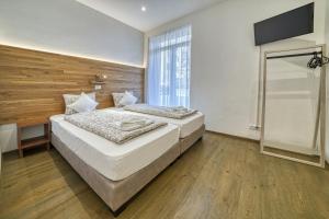 Ένα ή περισσότερα κρεβάτια σε δωμάτιο στο Apartment Heinz