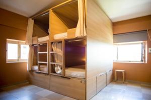 Postel nebo postele na pokoji v ubytování River Hostel