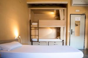 Postel nebo postele na pokoji v ubytování River Hostel