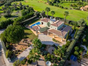 an aerial view of a house with a swimming pool at Villa Bliss by Algarve Vacation in Praia do Carvoeiro