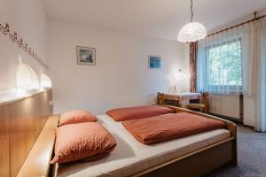 Postel nebo postele na pokoji v ubytování Pension Schwaiger