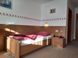 Postel nebo postele na pokoji v ubytování Pension Schwaiger