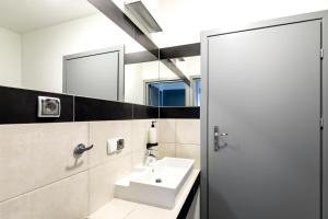 Kúpeľňa v ubytovaní Cooltour Hostel