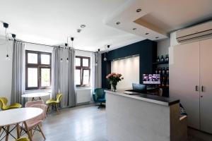 Televízia a/alebo spoločenská miestnosť v ubytovaní Cooltour Hostel