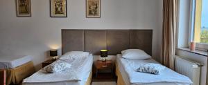 Łóżko lub łóżka w pokoju w obiekcie Letnia willa Jacuzzi & Sauna