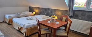 Łóżko lub łóżka w pokoju w obiekcie Letnia willa Jacuzzi & Sauna