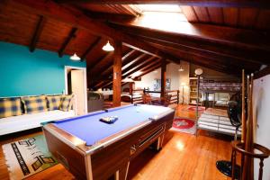 a living room with a pool table in it at Rural Enjoy Cantabria in Arnuero
