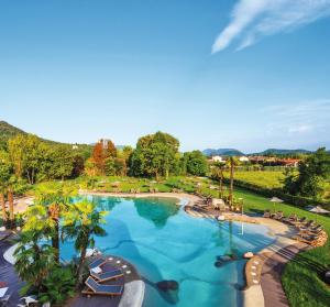 an overhead view of a swimming pool at a resort at La Fattoria Apartments in Lazise