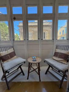 Posezení v ubytování Casa Nina Sliema Urban Residences + 15 fotografií