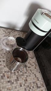 a toaster sitting on top of a kitchen counter at DOMUS VACANZE ROMANE in Rome