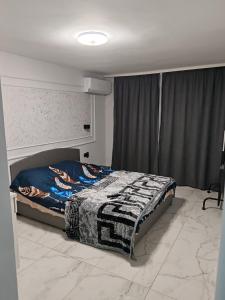 Postel nebo postele na pokoji v ubytování Zikin dom