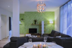 Χώρος καθιστικού στο Großzügiges Apartment am Altmühlsee mit Parkplatz