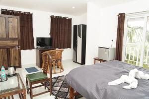 TV a/nebo společenská místnost v ubytování Samira Sea View