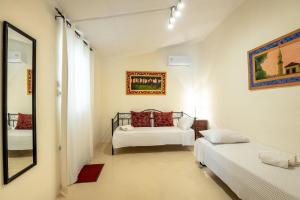 A bed or beds in a room at Casa Lion