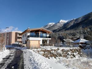 Nespecifikovaný výhled na hory nebo výhled na hory při pohledu z apartmánu