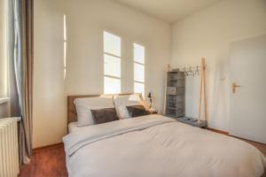 Postel nebo postele na pokoji v ubytování Apartmán v centru Olomouce