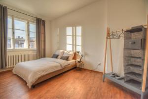 Voodi või voodid majutusasutuse Apartmán v centru Olomouce toas