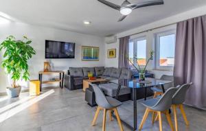 a living room with a couch and a table at House Dusa in Banjole