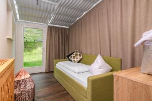 Postel nebo postele na pokoji v ubytování Gourmet AlpinHotel Sonnleiten + 37 fotografií