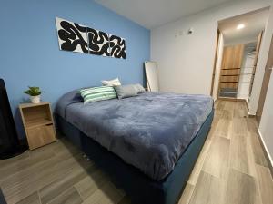 Postel nebo postele na pokoji v ubytování Depa Familiar Céntrico GDL con Estacionamiento