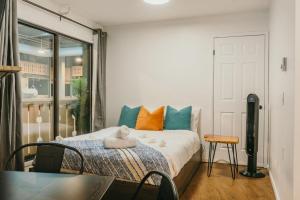 Ένα ή περισσότερα κρεβάτια σε δωμάτιο στο The Lifty Ski-In Ski-Out Studio, Pool and Gym +27 φωτογραφίες