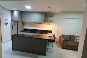 Η κουζίνα ή μικρή κουζίνα στο Flat mobiliado ap 25 Campinas - SP +14 φωτογραφίες