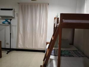 Postel nebo postele na pokoji v ubytování Sealor Pension House