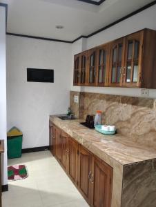Kuchyň nebo kuchyňský kout v ubytování Sealor Pension House