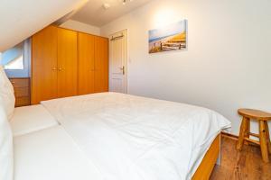 Postel nebo postele na pokoji v ubytování Sommerwind