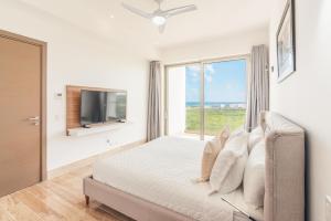 Fotografija u galeriji objekta Penthouse with 3BR and pool in Cap Cana u Punta Kani