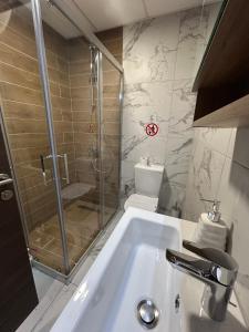 Koupelna v ubytování OpenView Apartment