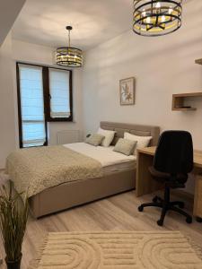 Ένα ή περισσότερα κρεβάτια σε δωμάτιο στο Studio Luxury Center