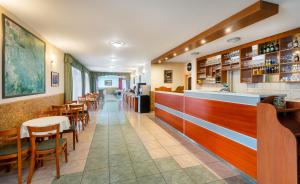 Lounge nebo bar v ubytování Platan Hotel