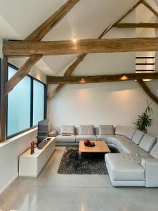 Posezení v ubytování Hoeve De Kleinheide
