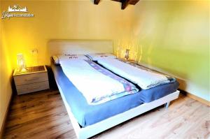 Posteľ alebo postele v izbe v ubytovaní Chalet 1816 by Livigno Accomodation