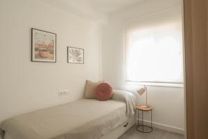 Postel nebo postele na pokoji v ubytování Beautiful sunny apartment + 4 fotografie