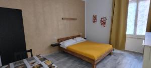 Postel nebo postele na pokoji v ubytování Le Quattro Stagioni