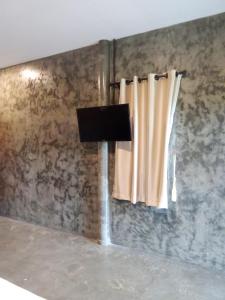 a bathroom with a window and a curtain at Hubkhao Resort in Ko Lanta +33 photos