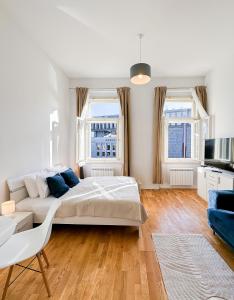 Postel nebo postele na pokoji v ubytování TurnKey I Wenceslas Square Apartments