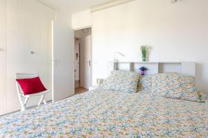Una cama o camas en una habitación de Appartement Lumineux et Confortable