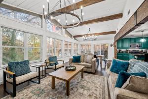 a living room with a couch and a table at River Cottage in Gatlinburg