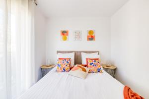 Ένα ή περισσότερα κρεβάτια σε δωμάτιο στο Au Cœur de Disneyland, Gare & Shopping à 2 pas