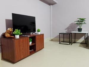 Televisyen dan/atau pusat hiburan di Ajem-Lar Homestay