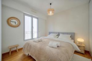 Posteľ alebo postele v izbe v ubytovaní Magnifique et lumineux 3 pieces A2B238
