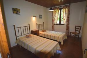 Ένα ή περισσότερα κρεβάτια σε δωμάτιο στο Maison contemporaine pour 12 personnes +17 φωτογραφίες