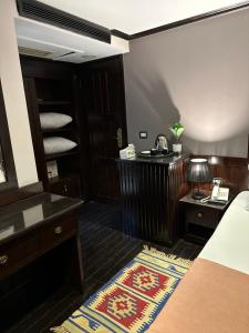 Voodi või voodid majutusasutuse YOU Nile View Hotel toas