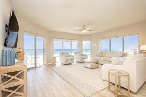 a living room with a view of the ocean at Emerald Isle Gulf Front 3B Condo - 308 in Pensacola Beach