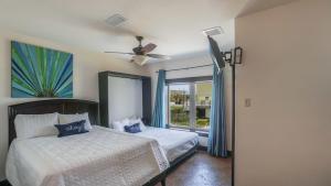 Кровать или кровати в номере High Life - 4B Beach Home +47 фотографий