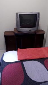 TV a/nebo společenská místnost v ubytování Departamento confortable en zona céntrica