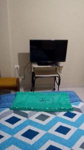 TV a/nebo společenská místnost v ubytování Departamento confortable en zona céntrica